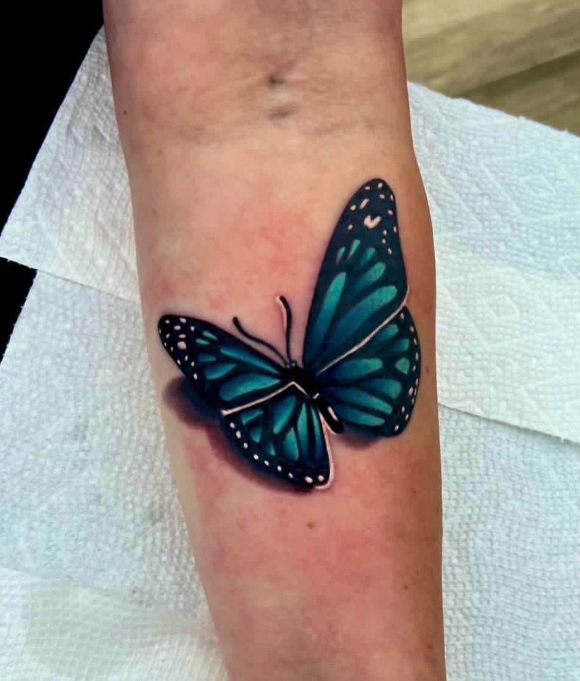 Couple of super vibrant butterflies done by tat2xcr33p3r hit him up to start that next piece you been wanting